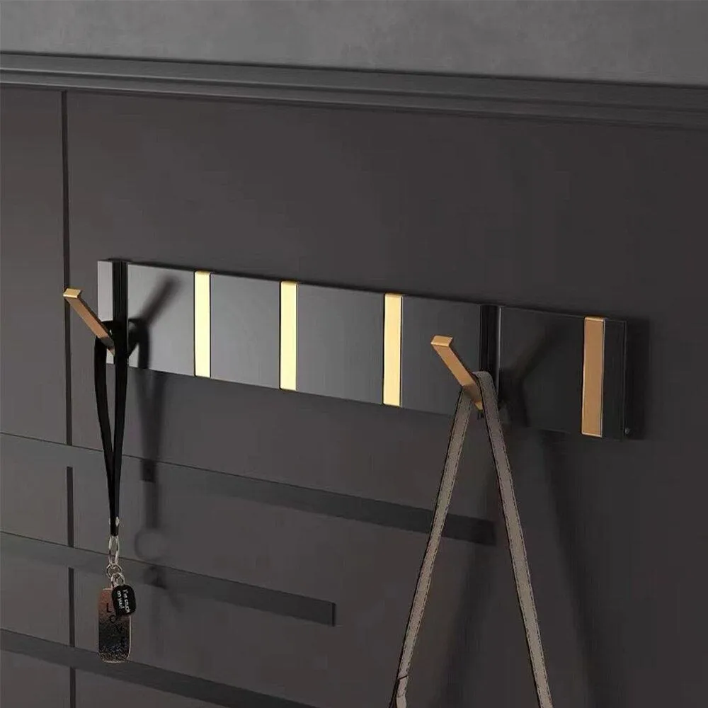 Elegant Black and Gold Foldable Wall Hook Rack for Stylish Storage Solutions